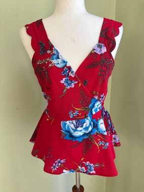 Monteau ted floral surplice tank with peplum size M. Cherry red w/blue. Great!